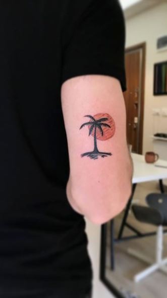 Colored Sun and Palm Tree Arm Tattoo