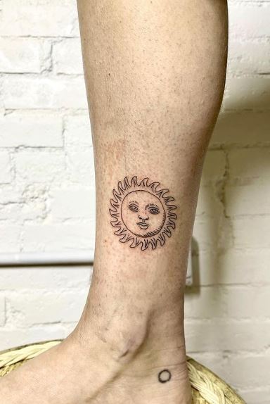 Sun with Face Ankle Tattoo