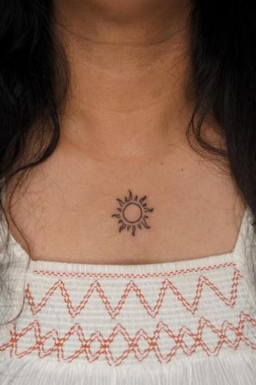Minimalistic Sun Chest Tattoo