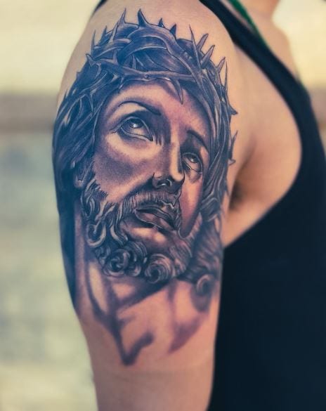 Black and Grey Jesus Christ Arm Tattoo