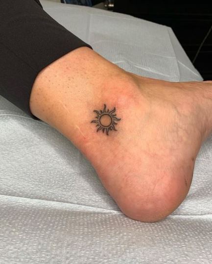 Minimalistic Sun Ankle Tattoo