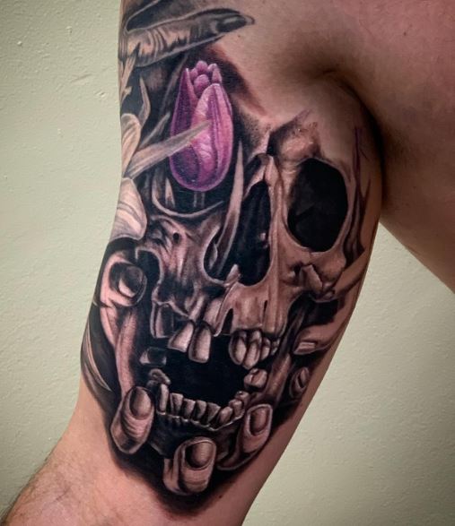Hand and Skull with Flower Inner Biceps Tattoo