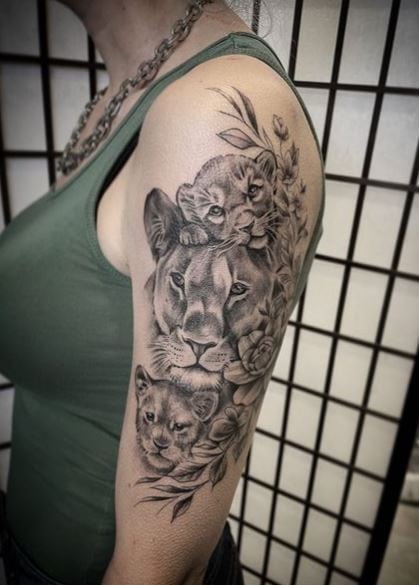 Flowers and Lioness with Cubs Arm Half Sleeve Tattoo