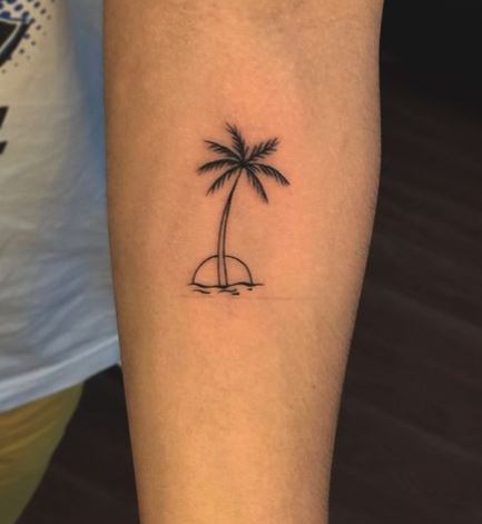 Grey Sun and Palm Tree by the Ocean Forearm Tattoo