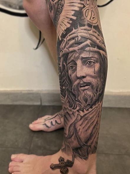 Praying Hands and Jesus Christ Leg Sleeve Tattoo