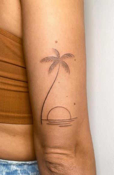 Sunset and Palm Tree by the Ocean Arm Tattoo