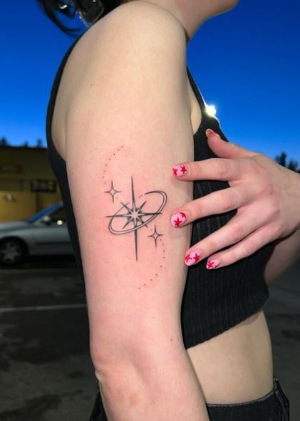 Sparkle and Stars Arm Tattoo