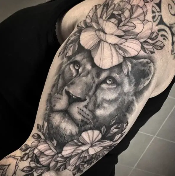 Flowers and Lioness Arm Half Sleeve Tattoo