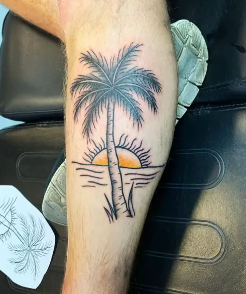 Colored Sunset and Palm Tree by the Ocean Forearm Tattoo