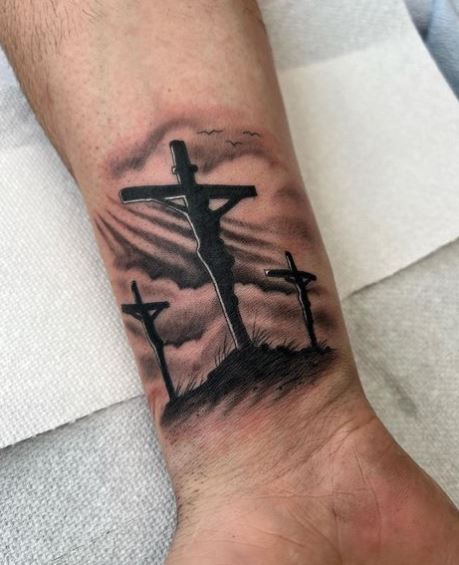 Black Crucifixion Wrist Tattoo