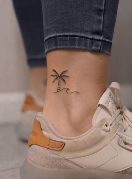 Black Wave and Palm Tree Ankle Tattoo