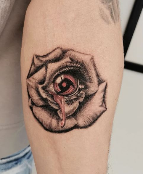 Rose and Itachi Sharingan Arm Tattoo