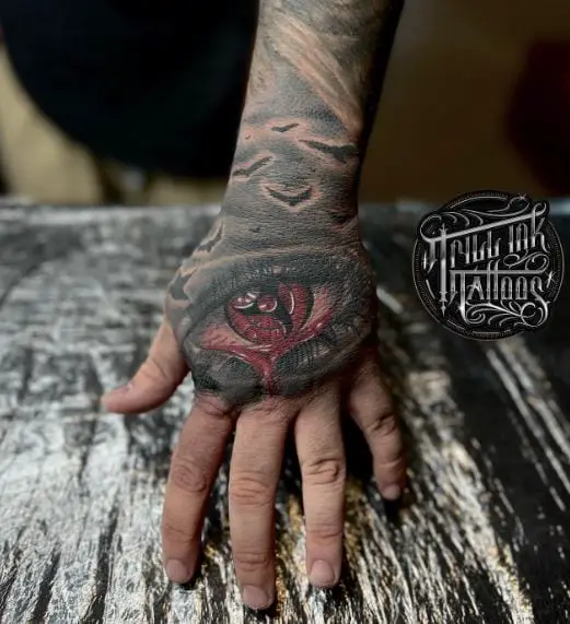 Birds and Itachi Sharingan Hand Tattoo