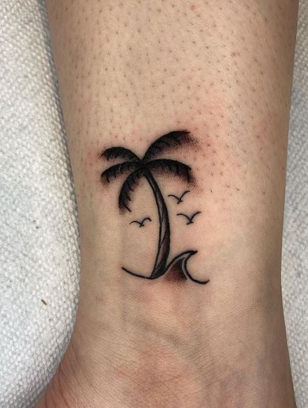 Birds and Palm Tree with Wave Leg Tattoo