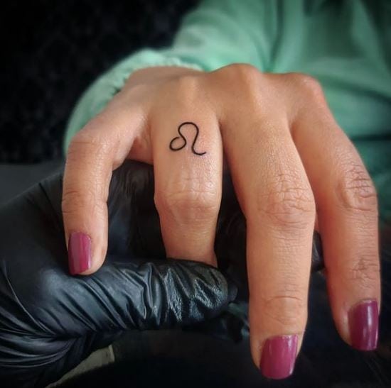 Minimalistic Leo Zodiac Sign Finger Tattoo