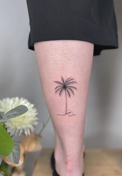 Sunset and Palm Tree with Wave Calf Tattoo