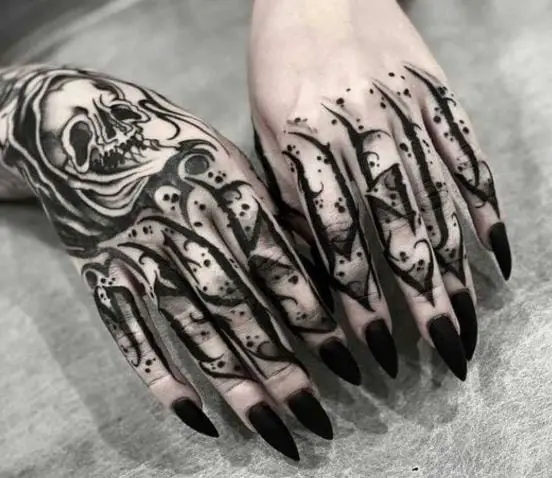 Skull and Gothic Tribal Hand and Fingers Tattoo