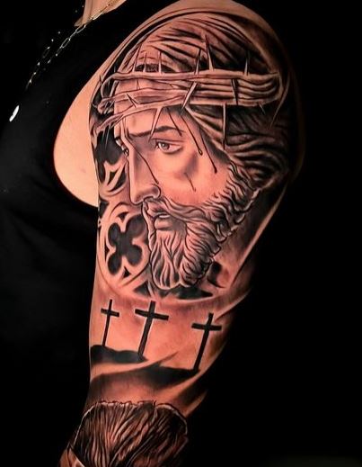 Jesus Christ and Crucifixion Arm Sleeve Tattoo