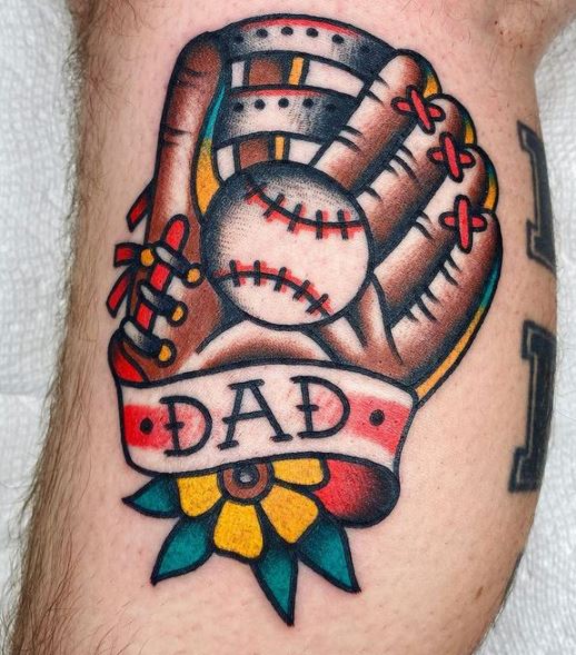 Baseball Equipment with Dad Banner and Flower Leg Tattoo