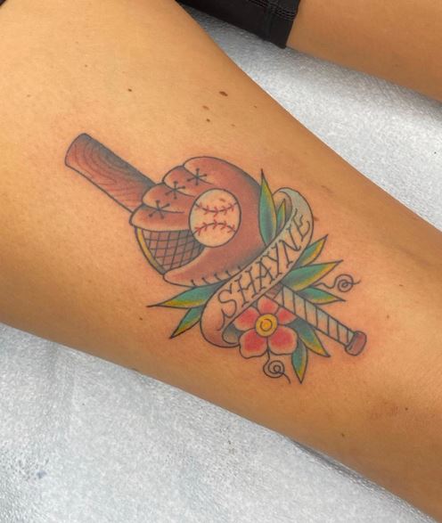 Baseball Equipment with Name and Flower Thigh Tattoo
