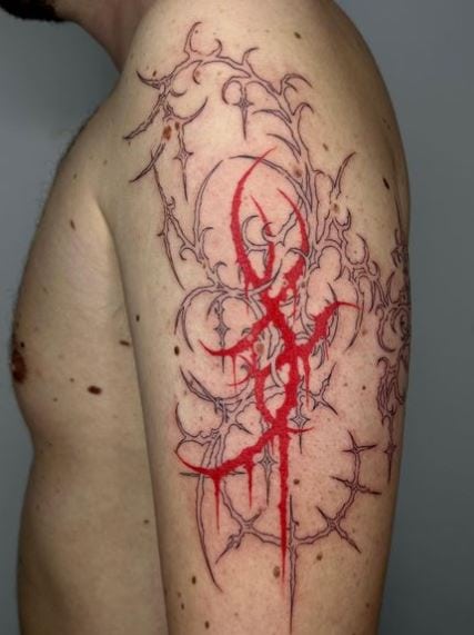 Red Ornamental Gothic Tribal Arm Tattoo