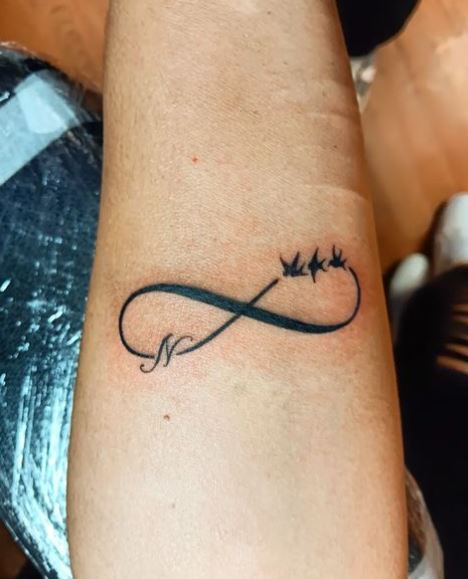 Black Infinity Symbol with Birds Forearm Tattoo