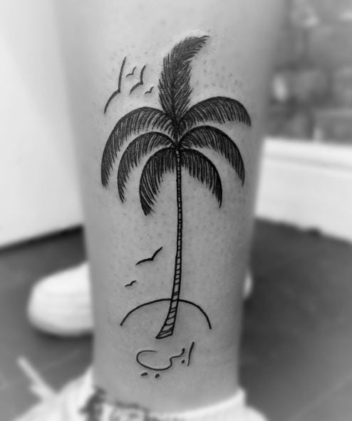 Birds and Palm Tree with Island Leg Tattoo