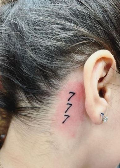 Vertical 777 Angel Number Behind Ear Tattoo