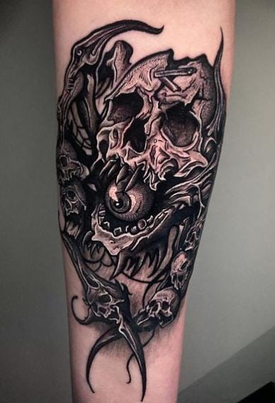 Eye Ball and Gothic Skulls Forearm Tattoo