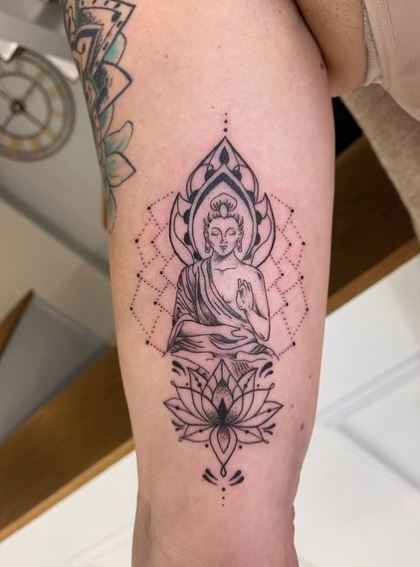 Lotus and Buddha Inner Biceps Tattoo