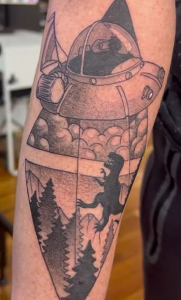 UFO, Dinosaur and Rick and Morty Arm Tattoo