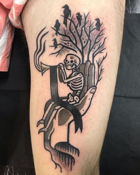 Hand and Gothic Skeleton with Trumpet Arm Tattoo