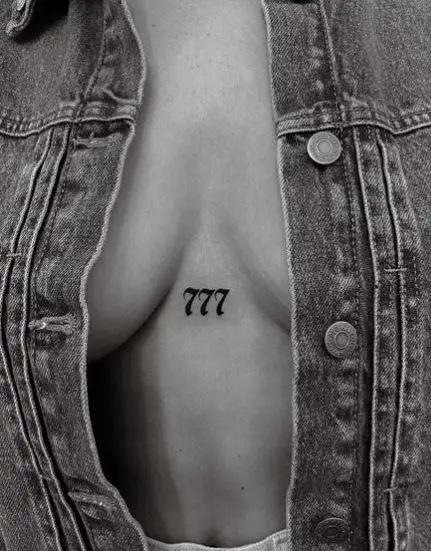 Black 777 Angel Number Sternum Tattoo