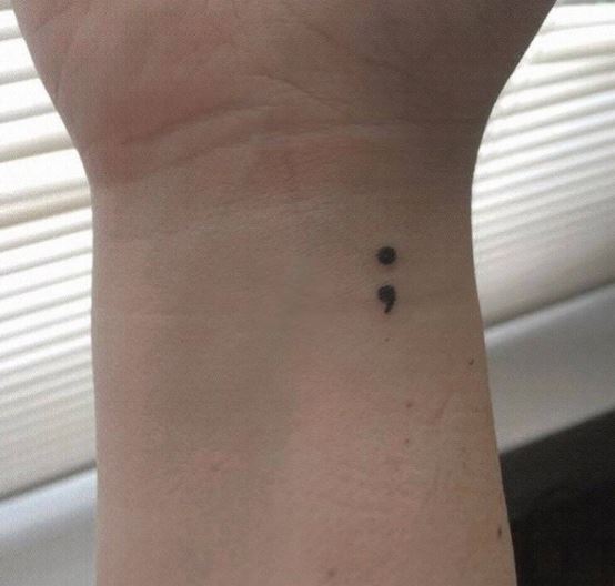 Grey Minimalistic Semicolon Wrist Tattoo