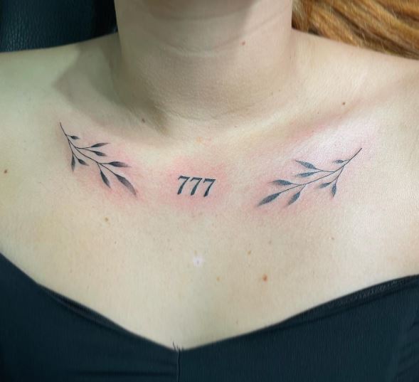 Leaves and 777 Angel Number Chest Tattoo