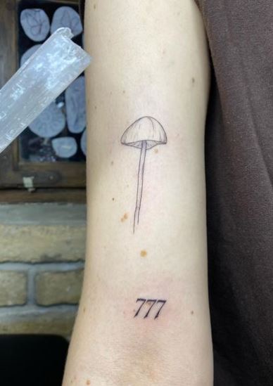 Mushroom and 777 Angel Number Biceps Tattoo