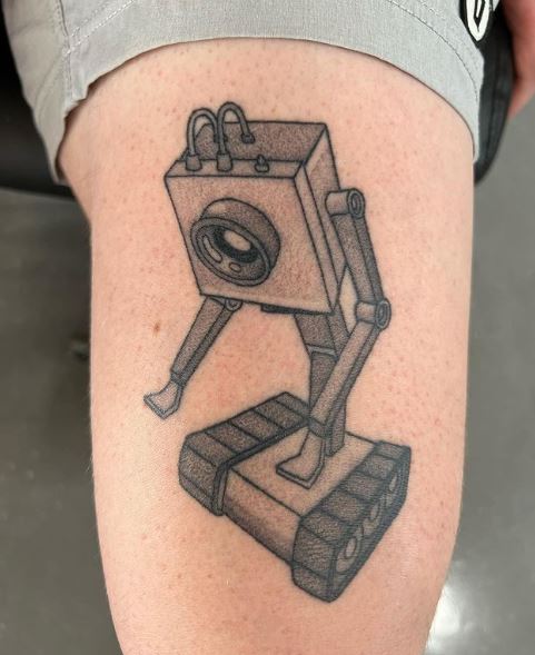 Grey Shaded Butter Bot Thigh Tattoo