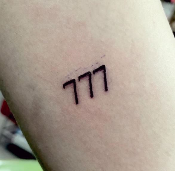 Black 777 Angel Number Tattoo