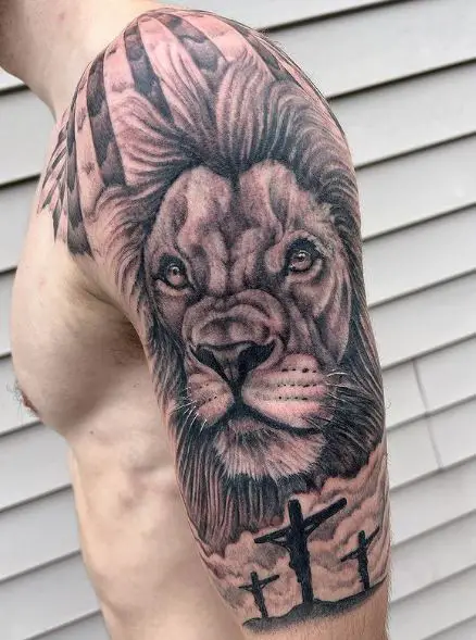 Crucifixion and Lion of Judah Arm Tattoo