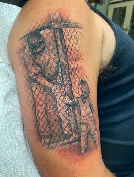 Grey Child and Baseball Player Arm Tattoo