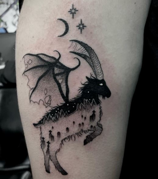 Moon with Stars and Goat with Wings Arm Tattoo