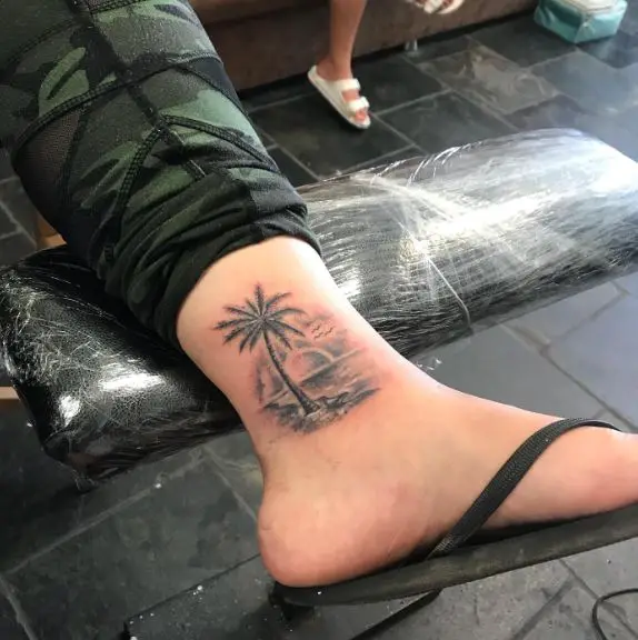 Ocean Landscape and Palm Tree Ankle Tattoo