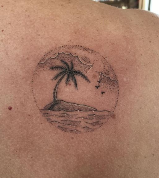 Sunshine and Palm Tree Island Back Tattoo