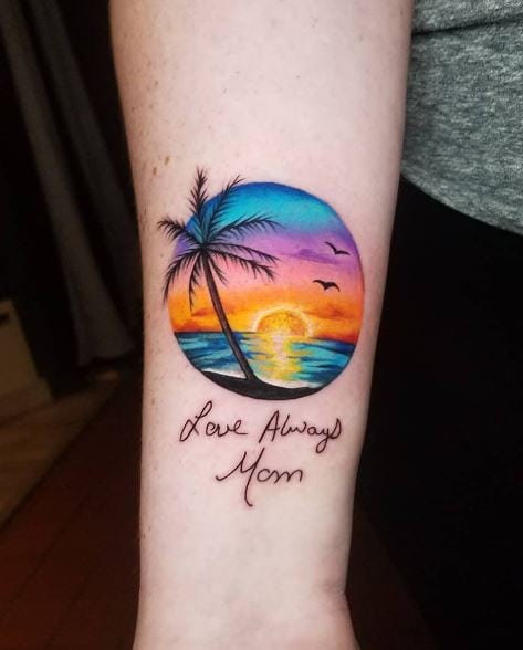 Colorful Sunset and Palm Tree with Script Arm Tattoo