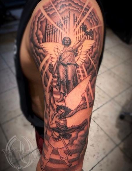 Demon and Angel Arm Sleeve Tattoo