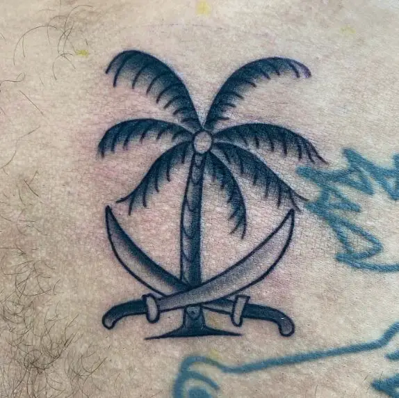 Crossed Swords and Traditional Palm Tree Tattoo