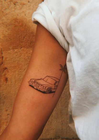 Cadillac and Palm Tree Inner Biceps Tattoo