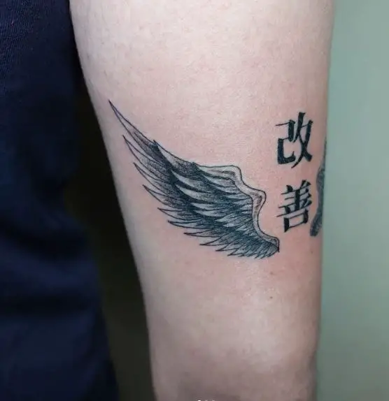 Angel Wings Back of Arm Tattoo