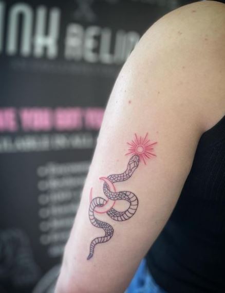 Black Snake and Red Sun and Moon Tattoo