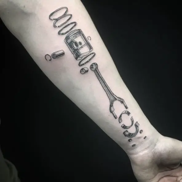 Black and Grey Dismantled Piston Forearm Tattoo